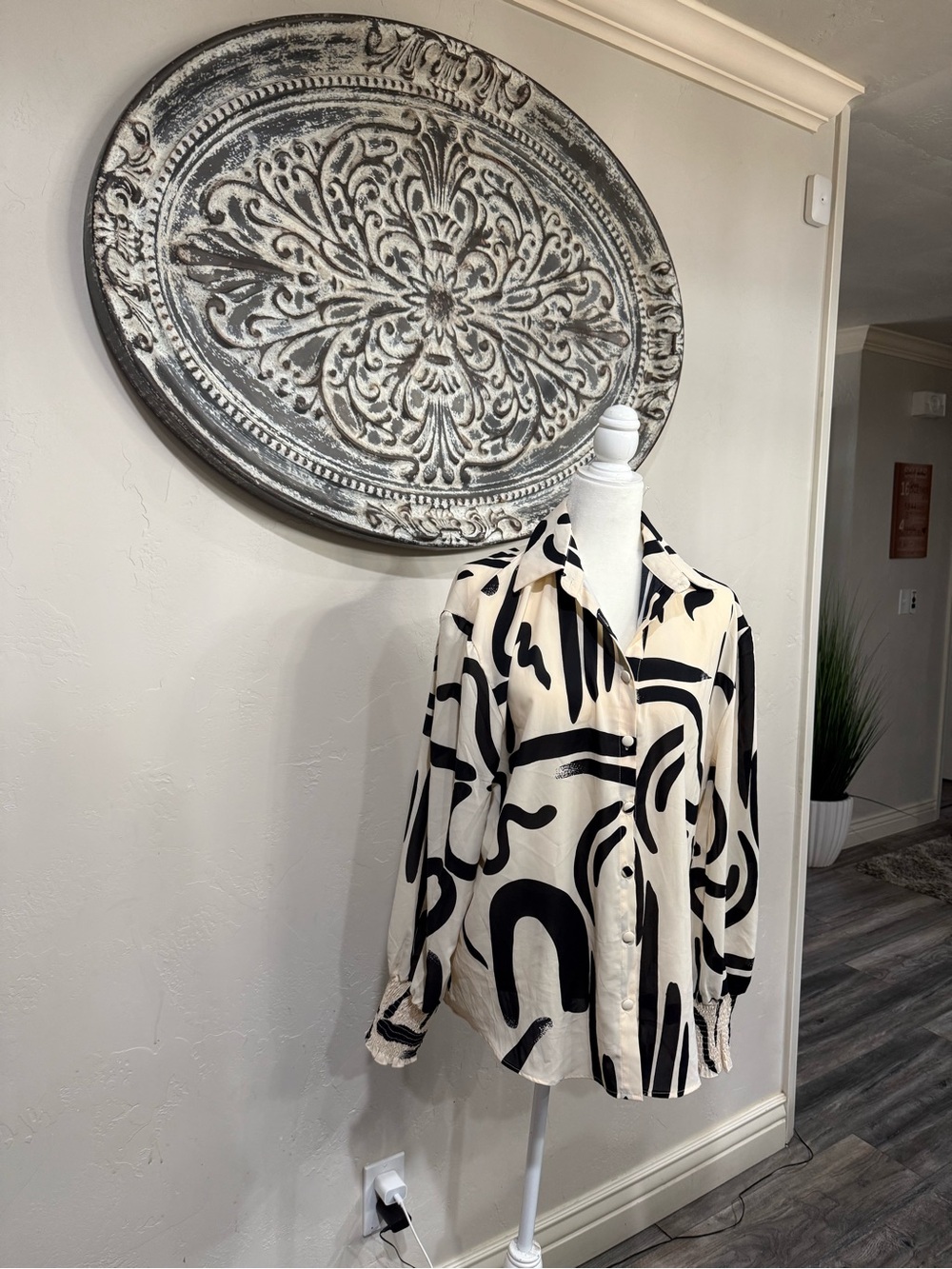 Elegant Cream and Black Abstract Button-Up Shirt by
